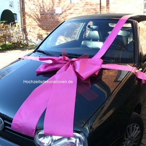 Gift bow pink car