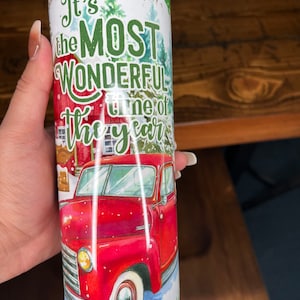Most Wonderful Time of the Year 20oz straight tumbler with metal straw.