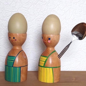 Swedish hand painted wooden egg cups from the 1950s-60s.