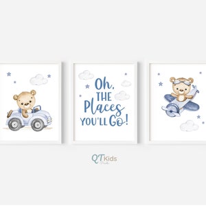May include: Three blue and white nursery prints featuring a brown teddy bear in a blue car, a blue airplane, and the text "Oh, the places you'll go!"