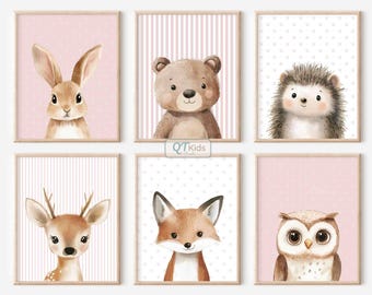 May include: Six framed art prints featuring adorable woodland animals: a bunny, bear, hedgehog, deer, fox, and owl. Each animal is depicted in a watercolor style against a pink or white patterned background. The prints are ideal for a nursery or children's room.