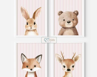 May include: Four framed art prints featuring watercolor illustrations of woodland animals: a rabbit, bear, fox, and deer. Each animal is set against a pink and white striped background. The prints are labeled "QTKids Prints".