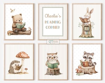 May include: Six framed art prints featuring woodland animals reading books. The prints include a bear, rabbit, hedgehog, owl, and raccoon, each with a book. One print reads "Charlie's Reading Corner". The prints have a neutral color palette.