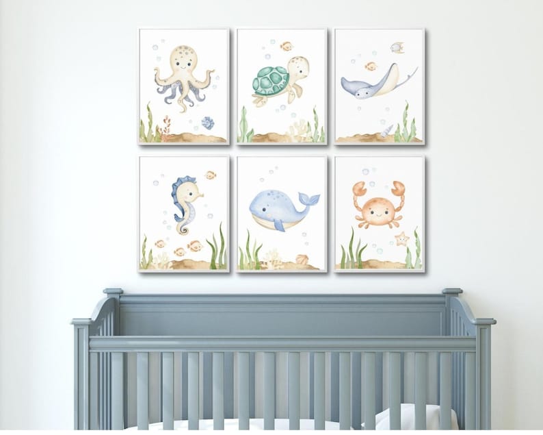 May include: Set of six watercolor illustrations featuring various sea creatures, including an octopus, turtle, stingray, seahorse, whale, and crab. Each illustration is framed with a white border and set against a white background.