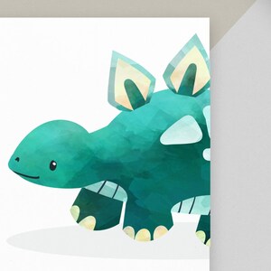 May include: A teal blue watercolor illustration of a cartoon dinosaur with yellow accents. The dinosaur has a friendly expression and is walking.