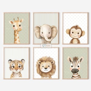 May include: Six framed animal art prints featuring a giraffe, elephant, monkey, tiger, lion, and zebra. Each print has a light green background with a different pattern. The animals are depicted in a cute, cartoon style.