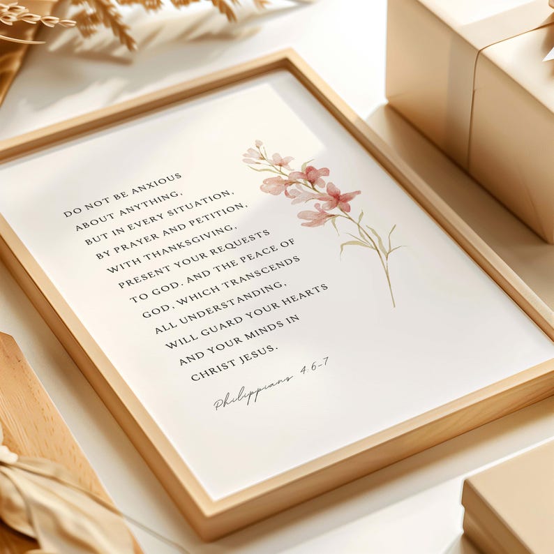 May include: A framed print with a watercolor floral design and a quote from Philippians 4:6-7. The quote reads: "Do not be anxious about anything, but in every situation, by prayer and petition, with thanksgiving, present your requests to God. And the peace of God, which transcends all understanding, will guard your hearts and your minds in Christ Jesus."