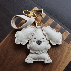 Louis Vuitton K9 puppy dog keychains Review!!!! One of a kind item