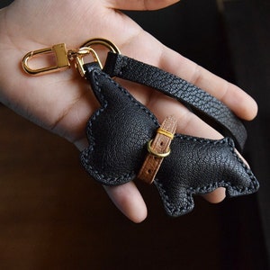 Lv dog keychain, Luxury, Accessories on Carousell