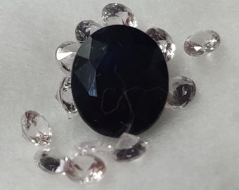 Midnight blue sapphire 1,75 ct + 12 white sapphires 0,75 ct