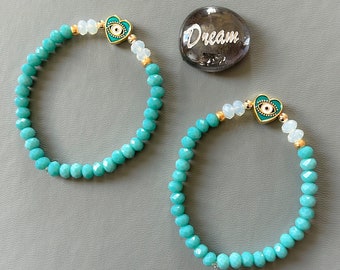 Turquoise green and gold crystal sparkly evil eye bracelet with gold heart shaped evil eye - protection bracelets