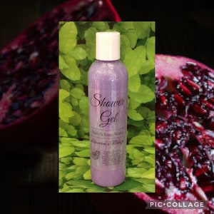 May include: A purple bottle of shower gel with a white label that reads "Shower Gel, Bath & Body Wash, Lauren's Wings". The bottle is sitting on a green leafy background.