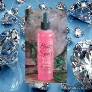 May include: A pink bottle of body spritz with a black spray top. The bottle has a white label with the text "Body Spritz" and "Body Fragrance" in black lettering. The label also includes the text "Lauren Windsor" in black lettering.