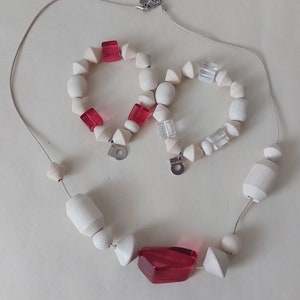 Aarikka,Finland,Jewelry Set,Necklace and two bracelets, wood and plastic.