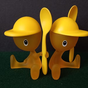Alessi Cico yellow plastic egg cups 2 pc set Design Stefano Giovannoni
