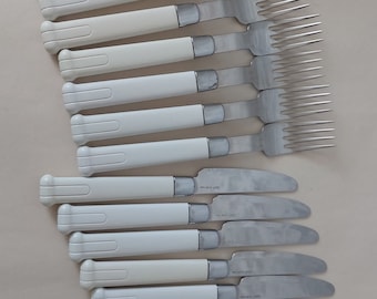 Abert nicrosil 18/10,Italy,set of vintage cutlery,6 knifes and 8 forks,with white plastic handles