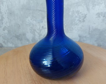 Beautiful twisted cobalt blue glass vase. Handmade.