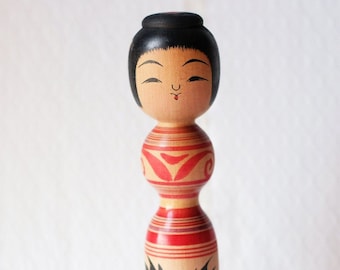 Old wooden Kokeshi doll from Japan
