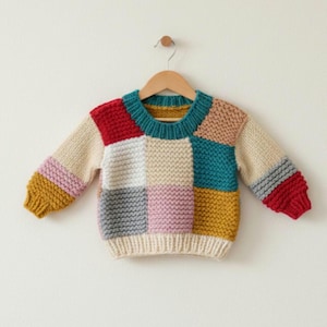 Maglione per neonati lavorato a mano: patchwork colorato, manica lunga