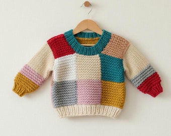 Handgebreide babytrui: kleurrijk patchwork, lange mouw