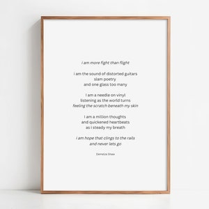 May include: A framed print of a poem about hope and resilience. The poem reads: "I am more fight than flight... I am hope that clings to the rails and never lets go." The poem is attributed to Demelza Shaw.