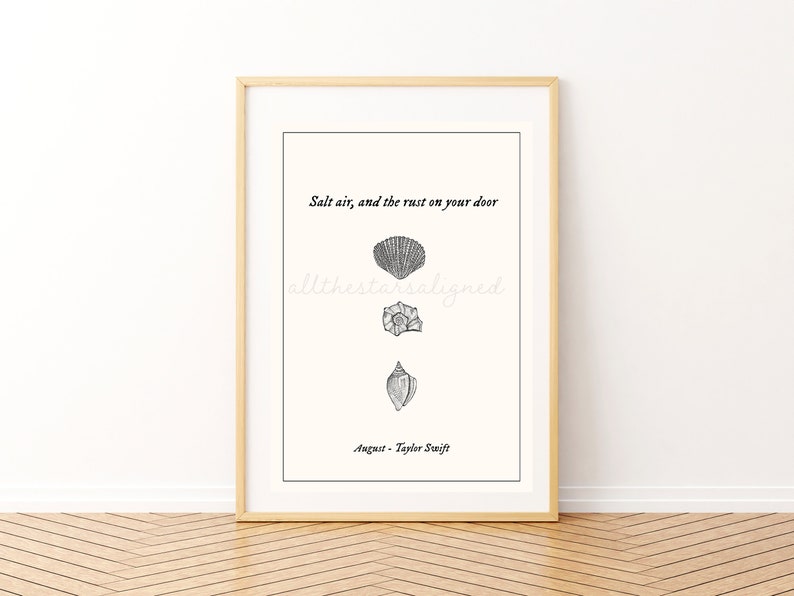 May include: A printable art print with a white background and black text that reads "Salt air, and the rust on your door, all the stars aligned, August - Taylor Swift". There are three black and white illustrations of seashells.