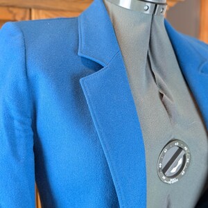 May include: A rustic wooden sign with the text "Welcome to our home" in white lettering. The sign features a distressed finish and a simple, inviting design, perfect for a front porch or entryway.