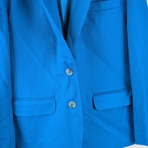 May include: A rustic wooden sign with the text "Welcome to our home" in white lettering. The sign features a distressed finish and a simple, inviting design, perfect for entryway decor.