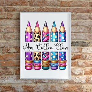 May include: A framed print featuring six colorful pencils with patterned designs, including polka dots and animal print. The text "Mrs. Cullen Class" is written below the pencils in a cursive font. The pencils are set against a white background.
