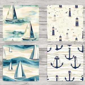 May include: Four square coasters with nautical themes. The first coaster features a watercolour illustration of sailboats on a blue and white background. The second coaster features a repeating pattern of lighthouses on a white background. The third coaster features a watercolour illustration of sailboats on a blue and white background. The fourth coaster features a repeating pattern of anchors on a white background.