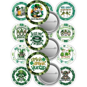 May include: A selection of St. Patrick's Day pin badges. Designs feature a cat with a drink, shamrocks, gnomes, and phrases such as "Kiss Me I'm Irish" and "Lucky Buck." The badges are circular with a metal backing.