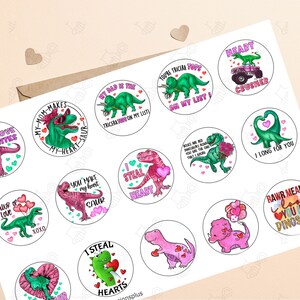 May include: A set of 12 round stickers featuring various dinosaur illustrations with Valentine's Day themed messages. The stickers are printed on white paper with a glossy finish. The dinosaurs are depicted in various colors, including pink, green, and red. The messages include "Love Bites", "My Mom Makes My Heart-Saur", "My Dad is the Triceratops on My List", "You're Triceratops on My List", "Heart Crusher", "You Make My Heart Saur", "I Steal Hearts", "Roses are Red Dinosaurs Roar You are the One That I Adore", "I Long for You", "Rawr Means I Love You in Dinosaur".