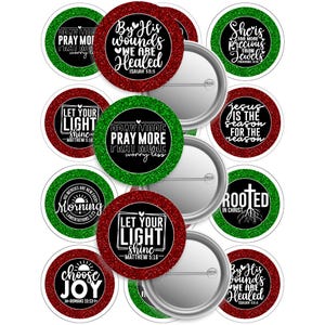 May include: A collection of round, glitter-edged pinback buttons in red, green, and silver. Each button features inspirational text, including phrases like "Let Your Light Shine" and "Pray More, Worry Less."