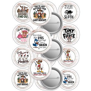 May include: A selection of round pin badges featuring comical text and cartoon images. Designs include a goat, sloth, mouse, and cowboy-themed characters. The badges have a white wood grain border.