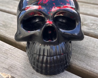 Jet black resin and red glitter skull