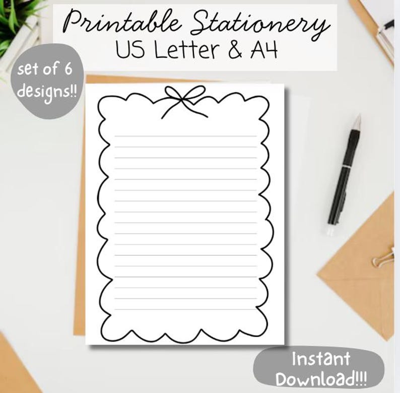May include: Printable stationery with a scalloped border and lined pages. The image includes the text "Printable Stationery US Letter & A4" and "set of 6 designs!!". A black pen and an envelope are also visible.