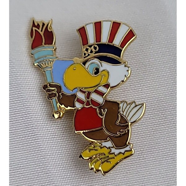 Sam The Eagle Holding Torch 1984 Olympic's Game Pin Tie Back Lepel Vest Hat Pin