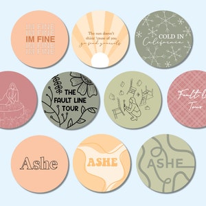 May include: Nine round stickers with various designs. The stickers feature text such as "IM FINE", "The sun doesn't shine 'cause of you, go find yourself", "COLD IN California", "THE FAULT LINE TOUR", "Fault Line Tour", and "Ashe".