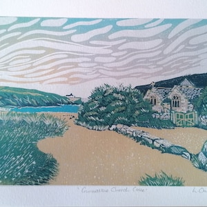 May include: A colourful linocut print depicting a stone church with a green roof and a gate, set against a backdrop of a blue bay and a cloudy sky. The print is titled "Gunwalloe Church Cove" and signed "L. Audrey 2023".