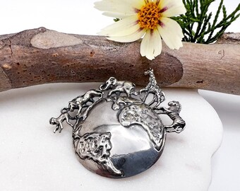 Spilla vintage in argento sterling con terra e animali