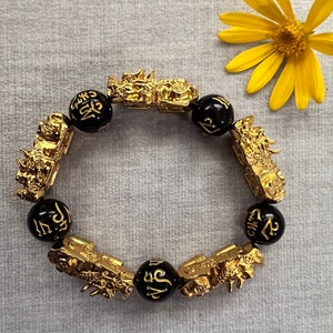 Feng-Shui Hand-Carved Obsidian Mantra Bead Bracelet w/ 5 24k Overlay Gold  PiXiu or PiYao Attracts Wealth & Luck