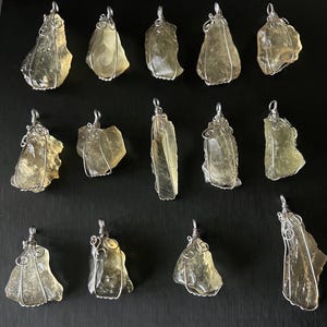 Natural Free-Form Raw Libyan Desert Glass Pendant from the Desert, elegantly wire-wrapped with silver wire