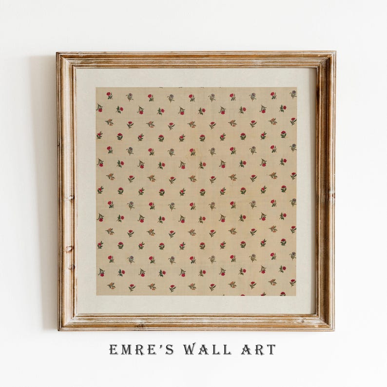 May include: Framed wall art featuring a repeating pattern of small red flowers with green leaves on a beige background. The artwork is in a wooden frame with a white mat. The text "EMRE'S WALL ART" is printed at the bottom.