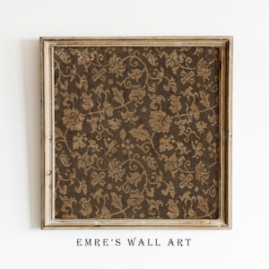 An antique-style botanical fabric art print featuring an intricate rustic textile pattern in warm brown tones. The design shows woven floral vines and leaves, arranged in an old-world tapestry style. The soft contrast between background and pattern gives a sense of depth and age. Ideal for vintage-inspired digital wall decor and home styling.