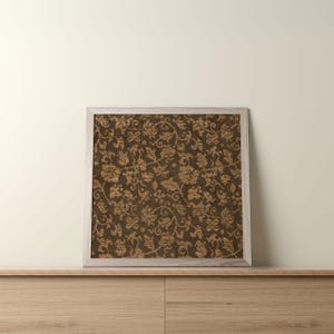 An antique-style botanical fabric art print featuring an intricate rustic textile pattern in warm brown tones. The design shows woven floral vines and leaves, arranged in an old-world tapestry style. The soft contrast between background and pattern gives a sense of depth and age. Ideal for vintage-inspired digital wall decor and home styling.