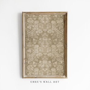 May include: A rectangular wall art piece featuring a light brown background with a repeating cream-colored floral damask pattern. The artwork is enclosed in a thin, weathered wooden frame. The text EMRE'S WALL ART is printed at the bottom.