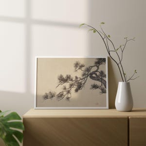 A vintage Japanese ink wash painting of a pine tree branch with detailed pine needles and a small pinecone against a textured beige paper background. The elegant black brushstrokes capture a minimalist, traditional East Asian artistic look. A small red artist seal is visible in the bottom right corner.