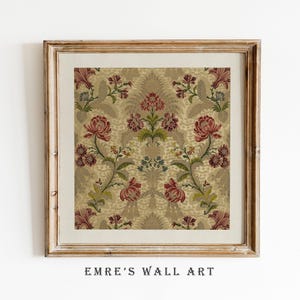 May include: A framed floral print featuring a repeating pattern of red, pink, and green flowers on a beige background. The print is in a wooden frame with the text "EMRE'S WALL ART" at the bottom.
