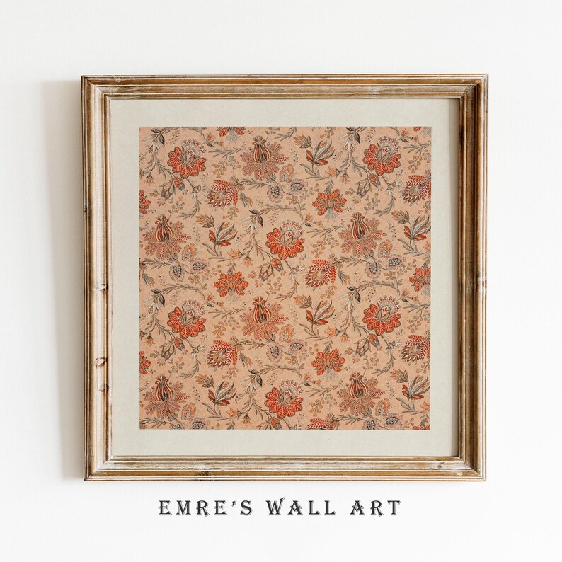 May include: Framed wall art featuring a repeating floral pattern in shades of orange, red, and gray on a beige background. The artwork is enclosed in a gold-toned wooden frame. The text "EMRE'S WALL ART" is printed at the bottom.