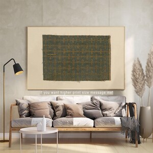 Rustic green and gold woven fabric fragment print, vintage textile motif digital art, ideal for antique tapestry wall decor and printable artwork.